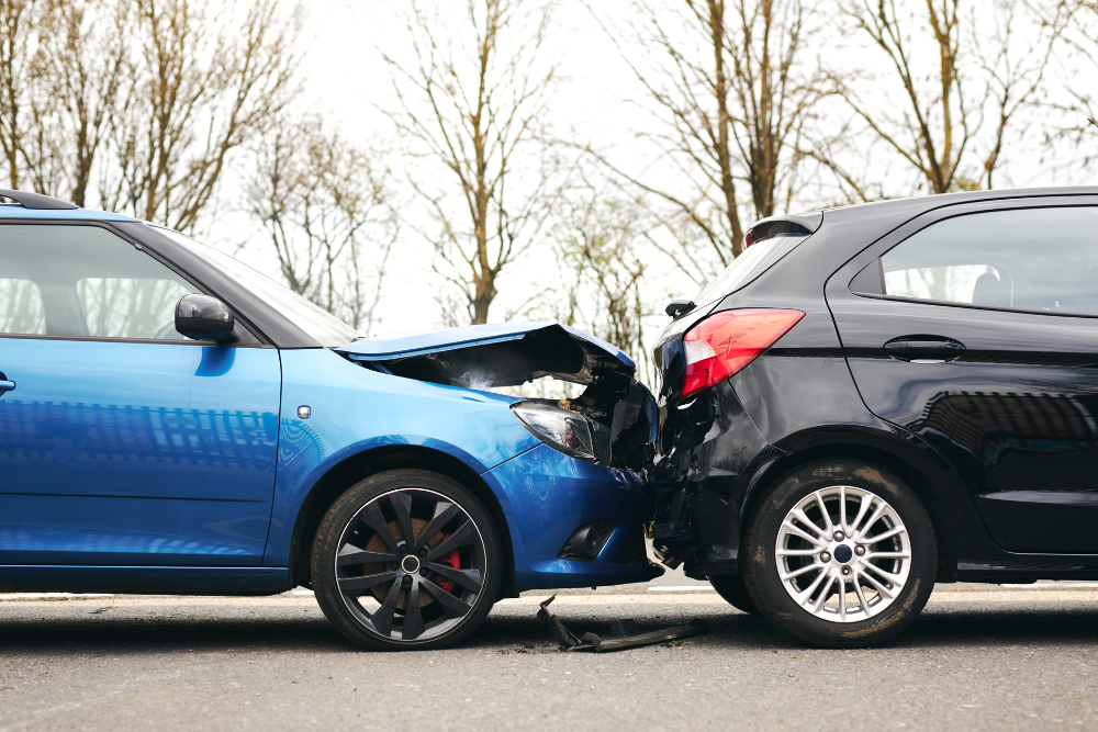 Cosmetic vs. collision damage guide, Auto Repair & Service, Auto Body Repair & Auto Collision Repair in McAllen, Edinburg & Harlingen, TX. Image shows a rear-end accident between two compact cars with visible damage.