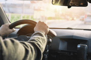 Steering laws, collision repair in Harlingen, TX, Premium Collision. Image of a driver behind the wheel, highlighting reliable vehicle performance, restored safety, and confidence on the road after professional auto repair services.