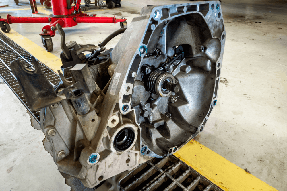 Transmission repair vs. replacement, auto repair in McAllen, TX. Image of a removed transmission housing with the input shaft and internal components visible during inspection and automotive service.